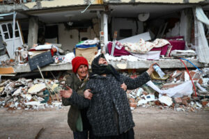 People-affected-by-a-major-earthquake-react-at-the-site-of-collapsed-buildings-in-Elbistan-district-of-Kahramanmaras