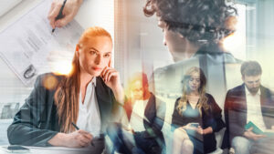 BusinessmanAndBusinesswomanInFormalSuitsOnJobInterview.Looking