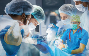 ConcentratedSurgicalTeamOperatingAPatientInAnOperationTheater