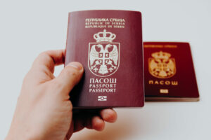 HandHoldingNewSerbianBiometricPassportWithOldOneOut