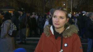 1703097503-Emilija-Milenkovic-o-protestima-ispred-RIK-a-1024x576