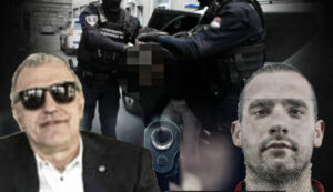 MysteriousManWearingBlackHoodieHoldingAPistolShootingWith