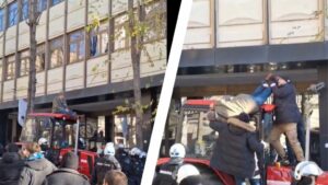 1734870080-policija_skida_kokanovica_sa_traktora_na_slaviji-1024x576