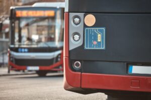 Red,Bus,For,Public,Transportation,Parked,On,A,Station.