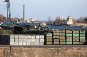 Boxes,Of,Ammunition,At,The,Pier,Before,Loading,A,Warship