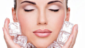 688z387-beautiful-young-woman-applies-ice-face